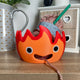 Emberling fire spirit yarn bowl showing unique flame-inspired character design