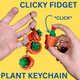 Clicky fidget plant keychain in green showing succulent shape on keyring