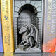 Black 3D printed dragon book nook insert showing dragon perched on spell books under gothic archway