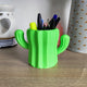 3D printed cactus pencil pot in green holding pencils and pens on desk